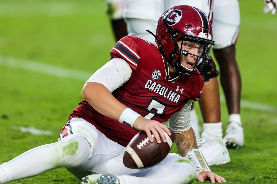 Oct 29, 2022; Columbia, South Carolina, USA; South Carolina Gamecocks quarterback Spencer Rattler (7) reacts after being sacked by the Missouri Tigers in the second half at Williams-Brice Stadium. Mandatory Credit: Jeff Blake-USA TODAY Sports