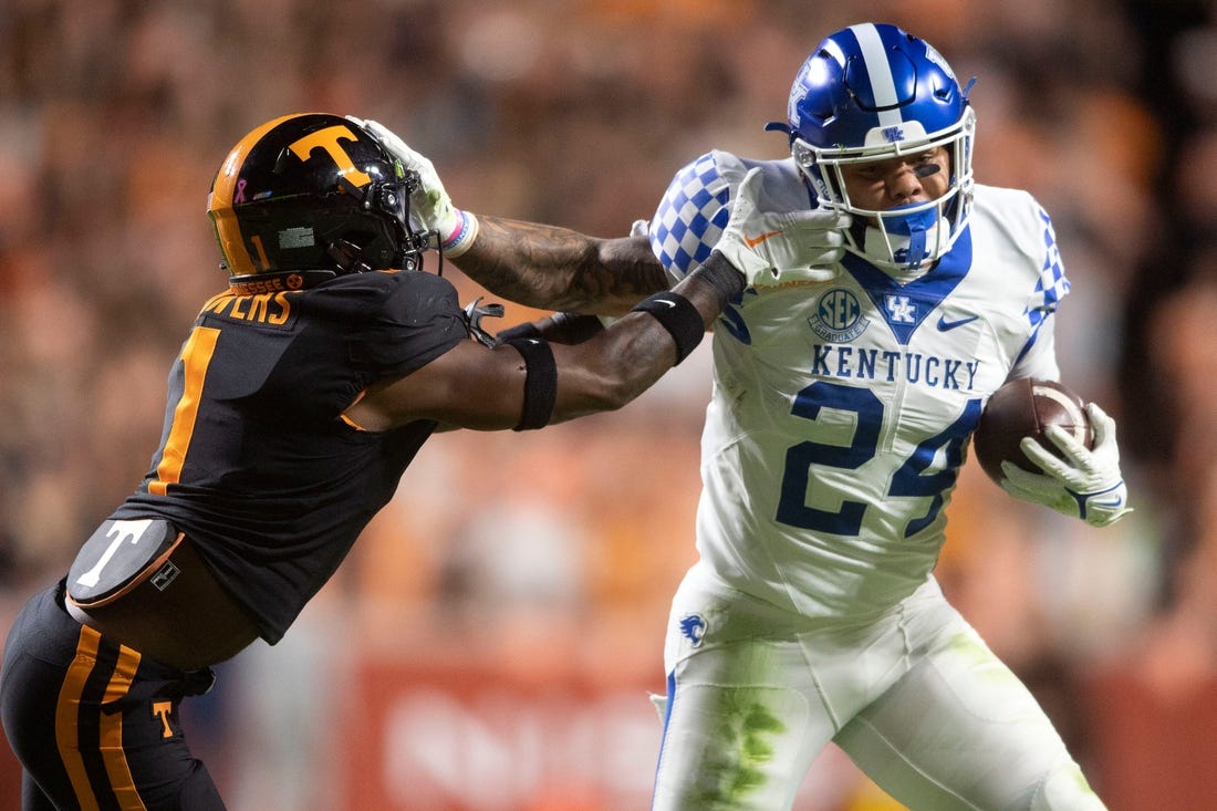 Kentucky running back Chris Rodriguez Jr. (24) holds back Tennessee defensive back Trevon Flowers (1) during the NCAA college football game between Tennessee and Kentucky on Saturday, October 29, 2022 in Knoxville, Tenn.

Utvkentucky1029