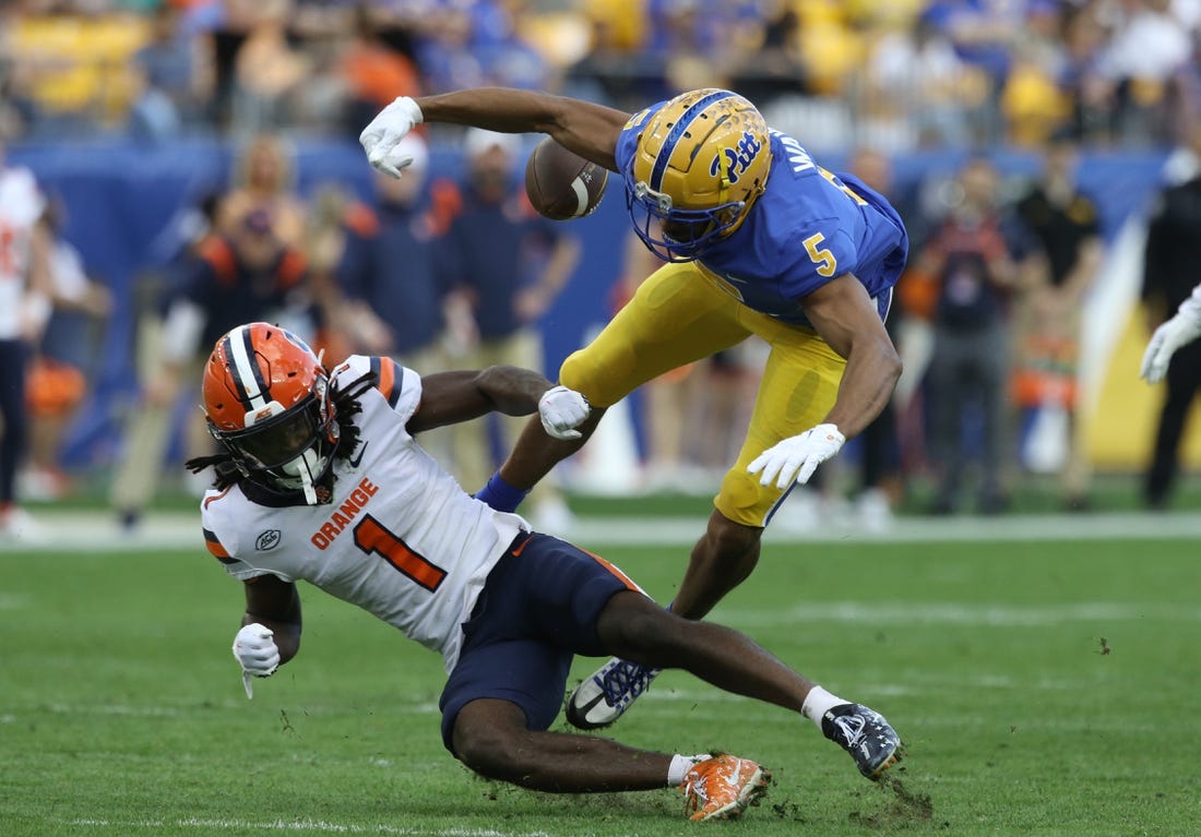 Nov 5, 2022; Pittsburgh, Pennsylvania, USA;  Syracuse Orange defensive back Ja'Had Carter (1) defends a pass intended for Pittsburgh Panthers wide receiver Jared Wayne (5) during the second quarter at Acrisure Stadium. Mandatory Credit: Charles LeClaire-USA TODAY Sports