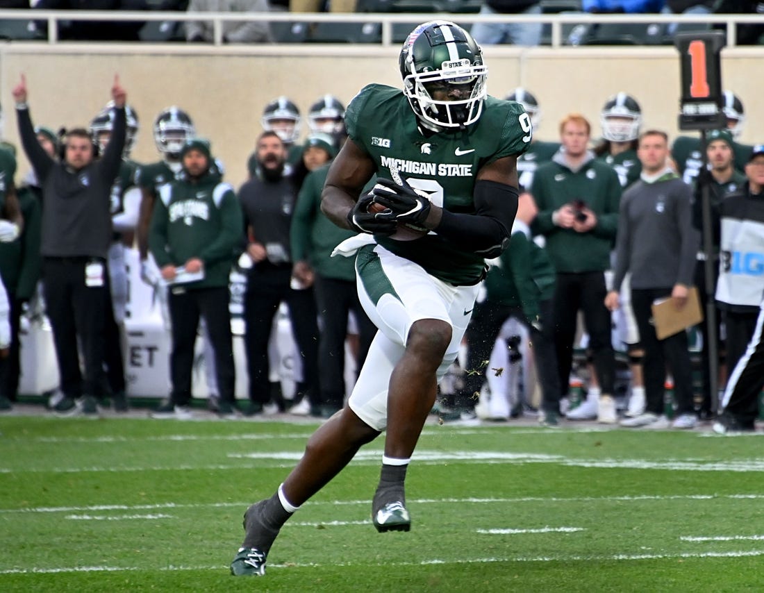 Nov 12, 2022; East Lansing, Michigan, USA;  Michigan State Spartans tight end Daniel Barker (9) sprints upfield for a touchdown in the first quarter at Spartan Stadium. Mandatory Credit: Dale Young-USA TODAY Sports