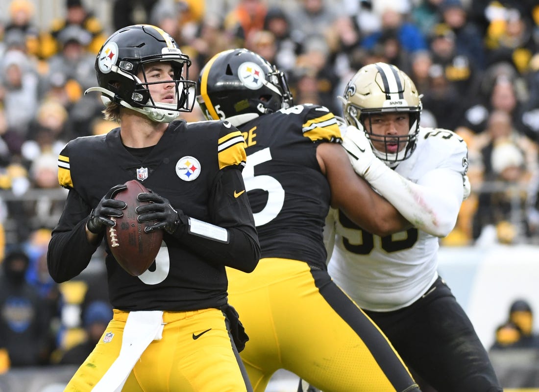 Nov 13, 2022; Pittsburgh, Pennsylvania, USA;  Pittsburgh Steelers quarterback Kenny Pickett (8) looks for a receiver against the New Orleans Saints during the second quarter at Acrisure Stadium. Mandatory Credit: Philip G. Pavely-USA TODAY Sports