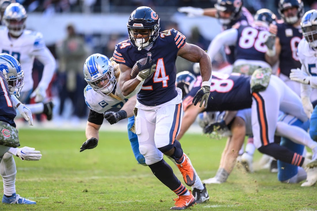 Nov 13, 2022; Chicago, Illinois, USA; Chicago Bears running back Khalil Herbert (24) runs the ball in the fourth quarter against the Detroit Lions at Soldier Field. Mandatory Credit: Daniel Bartel-USA TODAY Sports