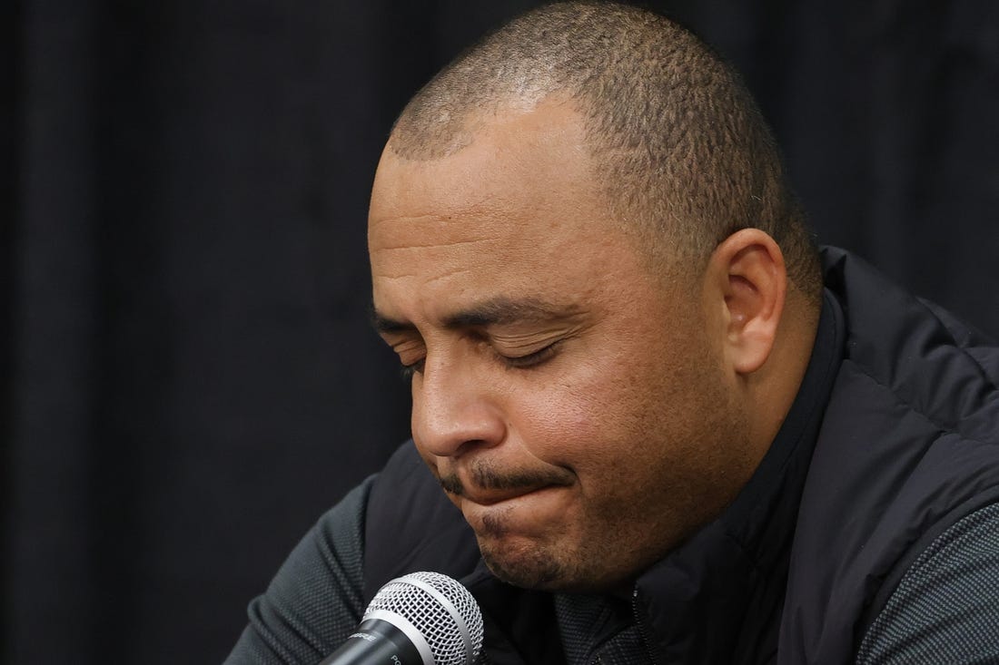 Nov 15, 2022; Charlottesville, Virginia, US; Virginia Cavaliers head coach Tony Elliott collects himself while answering a question from the media during a press conference regarding the deaths of three Cavaliers players from a shooting on the university grounds late Sunday night in Charlottesville. Mandatory Credit: Geoff Burke-USA TODAY NETWORK