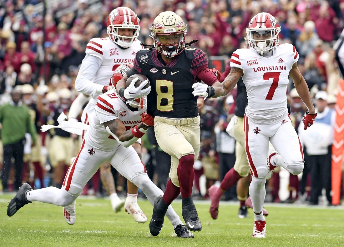 Nov 19, 2022; Tallahassee, Florida, USA; Florida State Seminoles running back Treshaun Ward (8) runs the ball for a touchdown during the first half of the game against the Louisiana Ragin' Cajuns at Doak S. Campbell Stadium. Mandatory Credit: Melina Myers-USA TODAY Sports