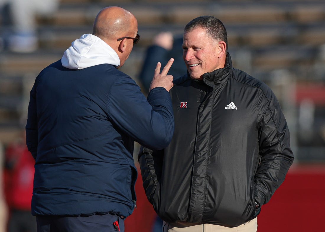 Nov 19, 2022; Piscataway, New Jersey, USA; Penn State Nittany Lions head coach James Franklin (left) talks with Rutgers Scarlet Knights head coach Greg Schiano before the game at SHI Stadium. Mandatory Credit: Vincent Carchietta-USA TODAY Sports