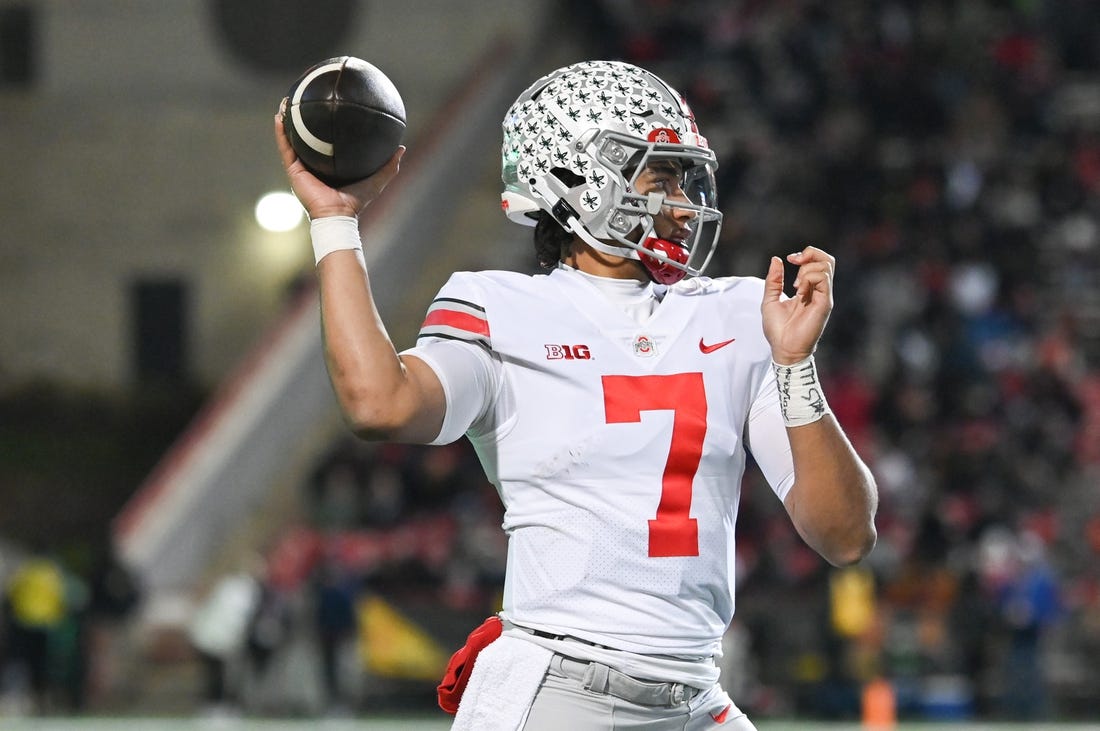 Nov 19, 2022; College Park, Maryland, USA; Ohio State Buckeyes quarterback C.J. Stroud (7) throws during the second half against the Maryland Terrapins  at SECU Stadium. Mandatory Credit: Tommy Gilligan-USA TODAY Sports