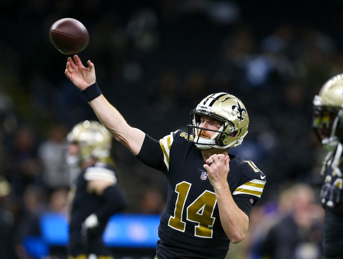 Nov 20, 2022; New Orleans, Louisiana, USA; New Orleans Saints quarterback Andy Dalton (14) warms up before the game against the Los Angeles Rams at the Caesars Superdome. Mandatory Credit: Chuck Cook-USA TODAY Sports