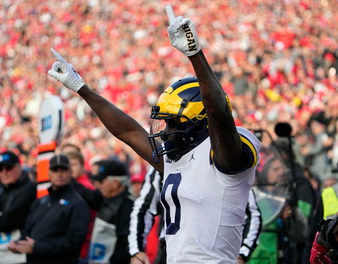 Nov 26, 2022; Columbus, OH, USA; Michigan Wolverines defensive back Mike Sainristil (0) celebrates after knocking the ball away from Ohio State Buckeyes tight end Cade Stover (8) on a play in the end zone in the fourth quarter of their game at Ohio Stadium.

Osu22um Kwr 55