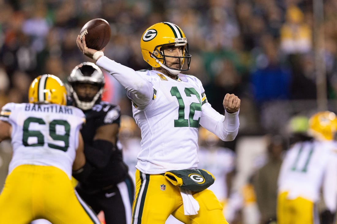 Nov 27, 2022; Philadelphia, Pennsylvania, USA; Green Bay Packers quarterback Aaron Rodgers (12) passes the ball against the Philadelphia Eagles during the second quarter at Lincoln Financial Field. Mandatory Credit: Bill Streicher-USA TODAY Sports