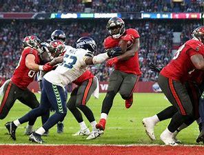 Leonard Fournette strides into the end zone for a touchdown in the Tampa Bay Buccaneers' win over the Seattle Seahawks in Munich, Germany.