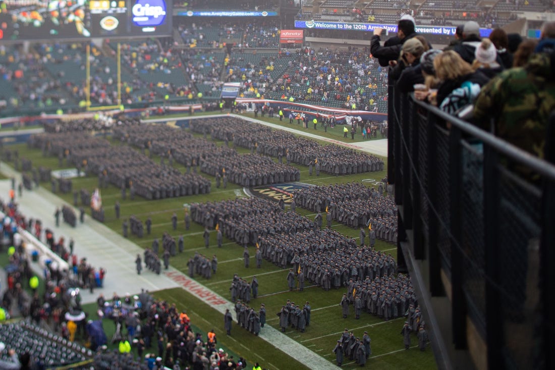 Dec 14, 2019; Philadelphia, PA, USA; (editors note; tilt shift lens used to create effect) General view as Army Cadets march onto the field before a game between the Army Black Knights and the Navy Midshipmen at Lincoln Financial Field. Mandatory Credit: Bill Streicher-USA TODAY Sports