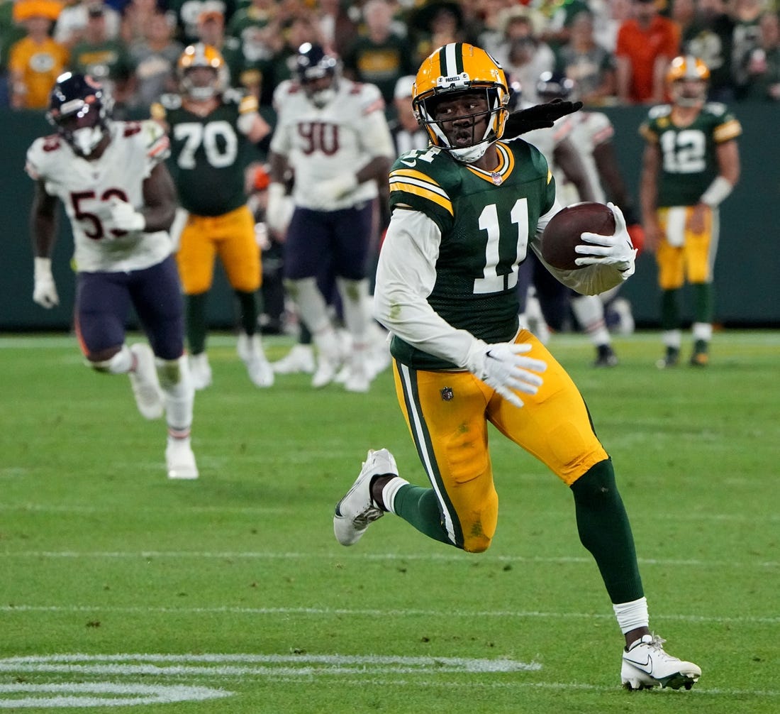 Sep 18, 2022; Green Bay, Wisconsin, USA; Green Bay Packers wide receiver Sammy Watkins (11) picks up 14 yards on a reception during the fourth quarter of their game at Lambeau Field. Mandatory Credit: Mark Hoffman/Milwaukee Journal Sentinel