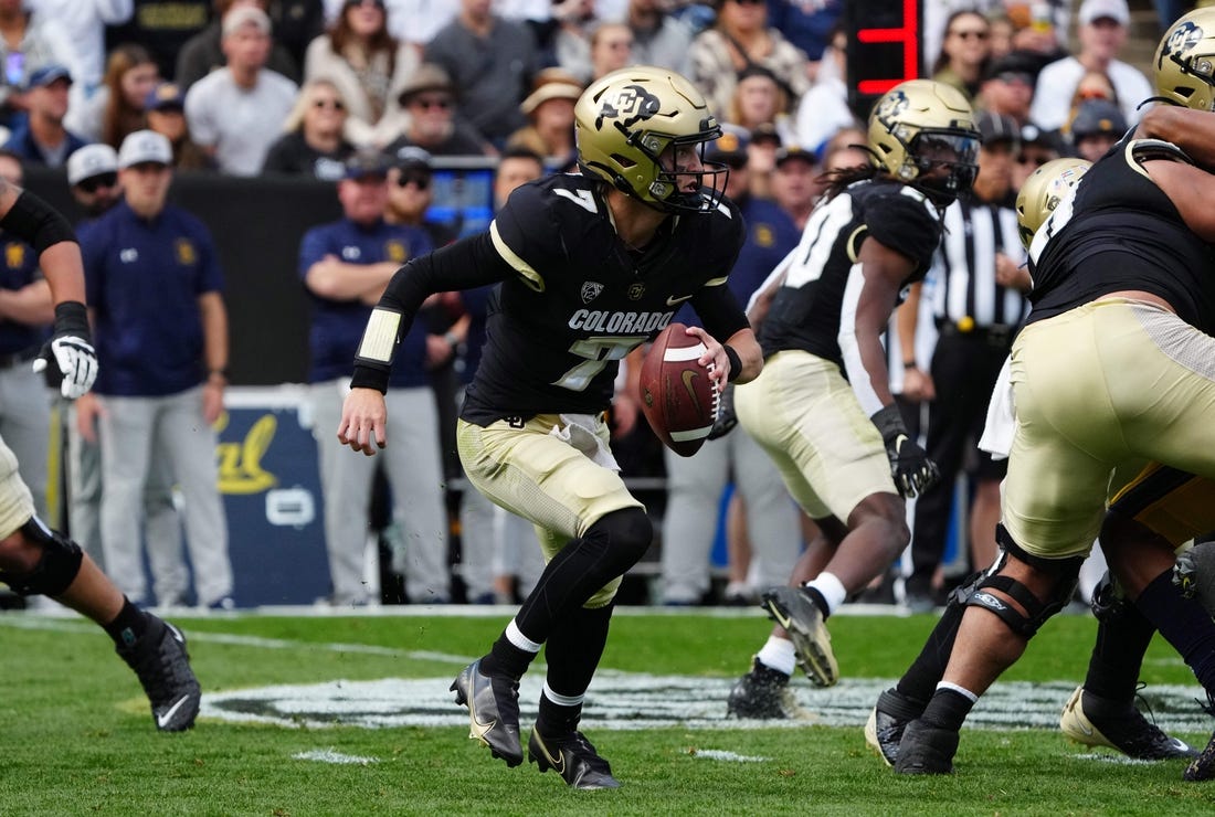 Oct 15, 2022; Boulder, Colorado, USA; Colorado Buffaloes quarterback Owen McCown (7) scrambles in the second quarter against the California Golden Bears at Folsom Field. Mandatory Credit: Ron Chenoy-USA TODAY Sports