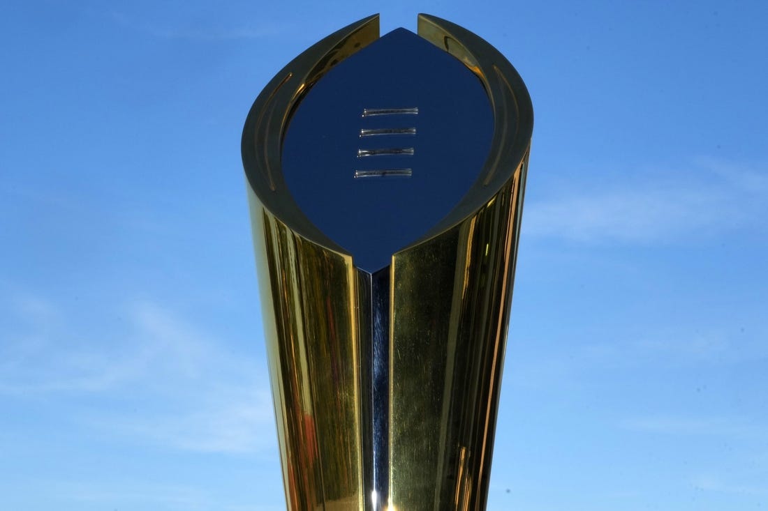 Nov 17, 2022; Los Angeles, California, USA; The College Football Playoff National Championship trophy at CFP press conference at Banc of California Stadium. Mandatory Credit: Kirby Lee-USA TODAY Sports