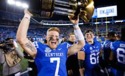 Nov 26, 2022; Lexington, Kentucky, USA; Kentucky Wildcats quarterback Will Levis (7) holds up the Governor   s Cup trophy after winning the game against the Louisville Cardinals at Kroger Field. Mandatory Credit: Jordan Prather-USA TODAY Sports