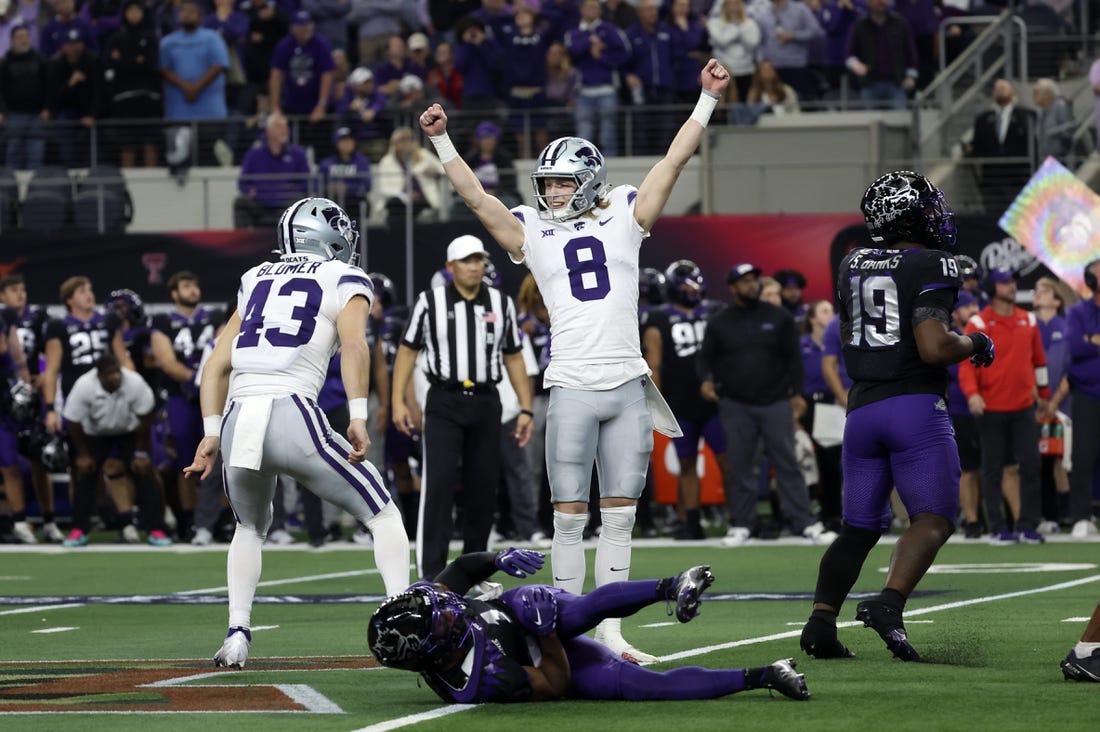Dec 3, 2022; Arlington, TX, USA; Kansas State Wildcats punter Ty Zentner (8) reacts after kicking  the game-winning field goal in overtime to defeat the TCU Horned Frogs at AT&T Stadium. Mandatory Credit: Kevin Jairaj-USA TODAY Sports