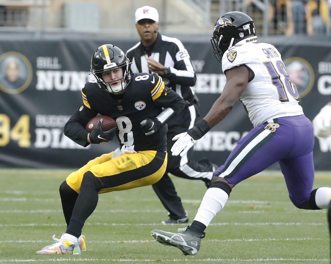 Dec 11, 2022; Pittsburgh, Pennsylvania, USA;  Pittsburgh Steelers quarterback Kenny Pickett (8) is sacked by  Baltimore Ravens linebacker Roquan Smith (18) during the first quarter at Acrisure Stadium. Mandatory Credit: Charles LeClaire-USA TODAY Sports