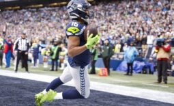 Dec 11, 2022; Seattle, Washington, USA; Seattle Seahawks wide receiver Tyler Lockett (16) catches a touchdown against the Carolina Panthers during the second quarter at Lumen Field. Mandatory Credit: Joe Nicholson-USA TODAY Sports