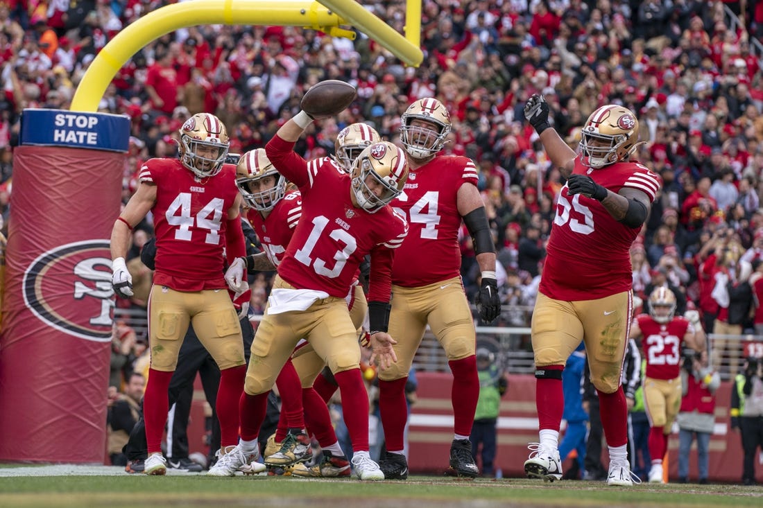 December 11, 2022; Santa Clara, California, USA; San Francisco 49ers quarterback Brock Purdy (13) celebrates after scoring a touchdown against the Tampa Bay Buccaneers during the second quarter at Levi's Stadium. Mandatory Credit: Kyle Terada-USA TODAY Sports