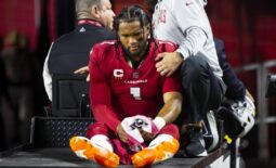 Dec 12, 2022; Glendale, Arizona, USA; Arizona Cardinals quarterback Kyler Murray reacts as he is carted off the field after suffering an injury against the New England Patriots in the first half at State Farm Stadium. Mandatory Credit: Mark J. Rebilas-USA TODAY Sports