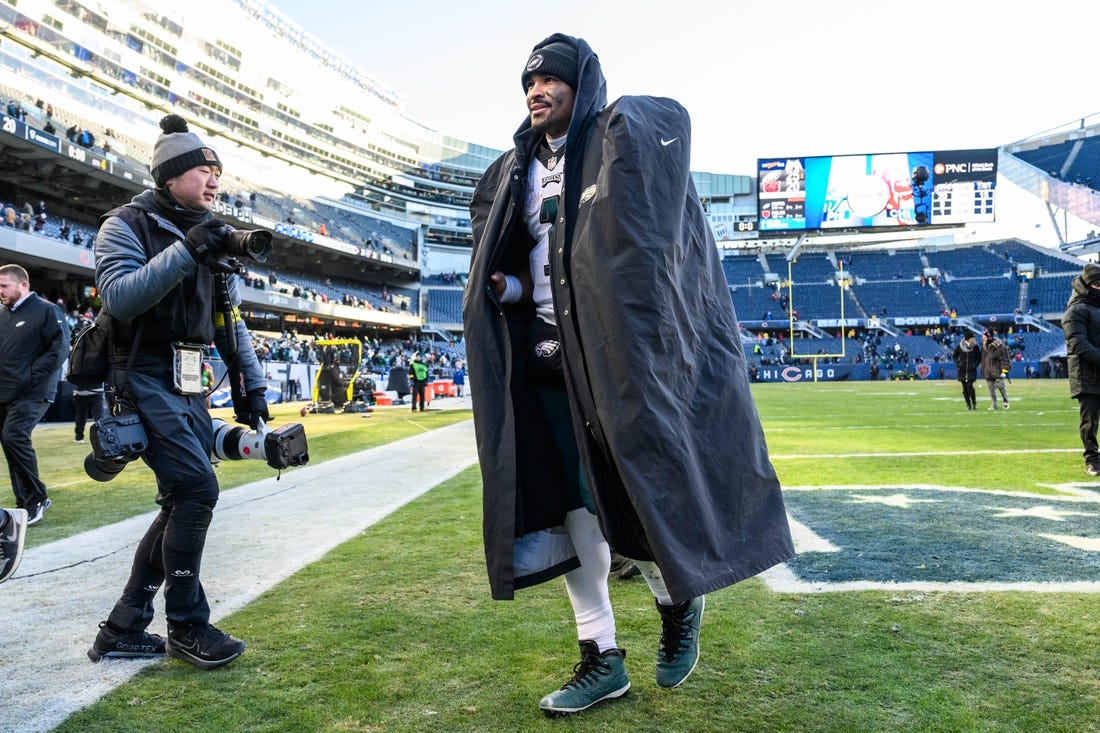 Dec 18, 2022; Chicago, Illinois, USA; Philadelphia Eagles quarterback Jalen Hurts (1) walks off the field after the game against the Chicago Bears at Soldier Field. Mandatory Credit: Daniel Bartel-USA TODAY Sports
