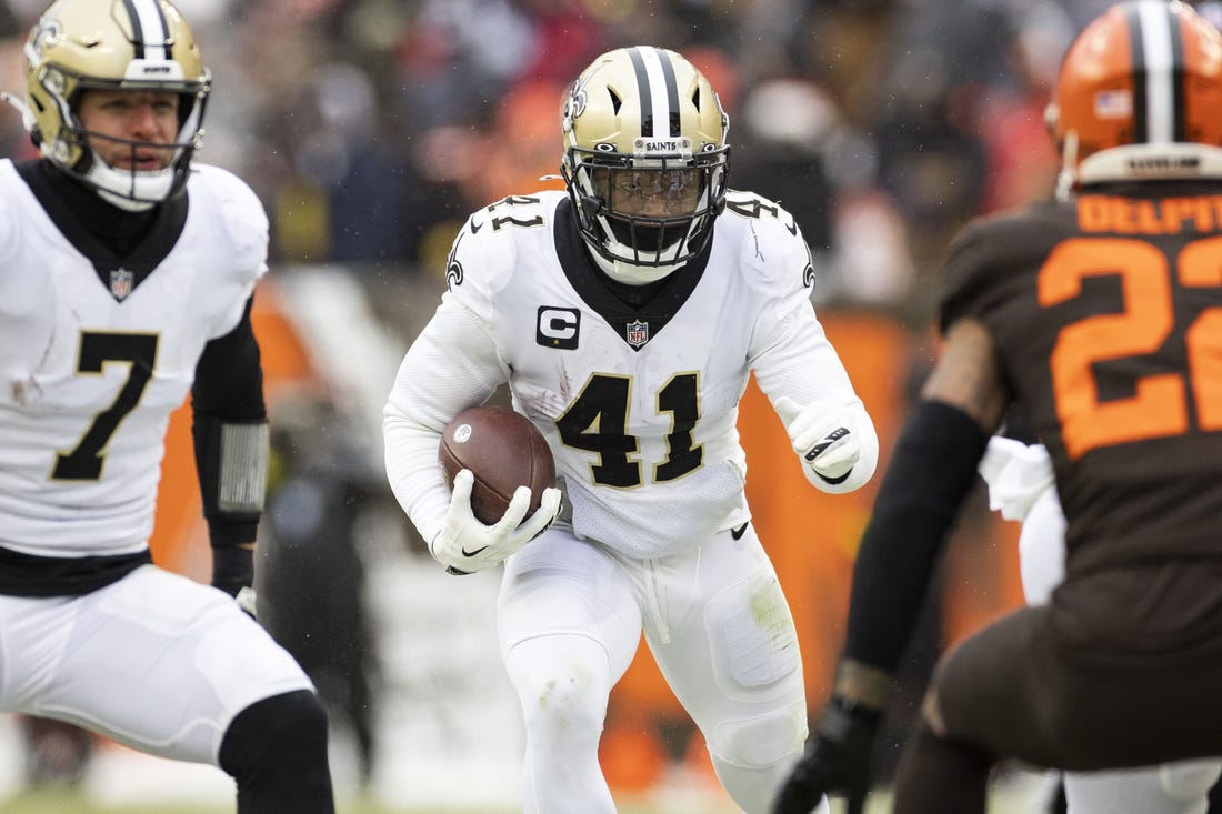 Dec 24, 2022; Cleveland, Ohio, USA; New Orleans Saints running back Alvin Kamara (41) runs the ball against the Cleveland Browns during the second quarter at FirstEnergy Stadium. Mandatory Credit: Scott Galvin-USA TODAY Sports