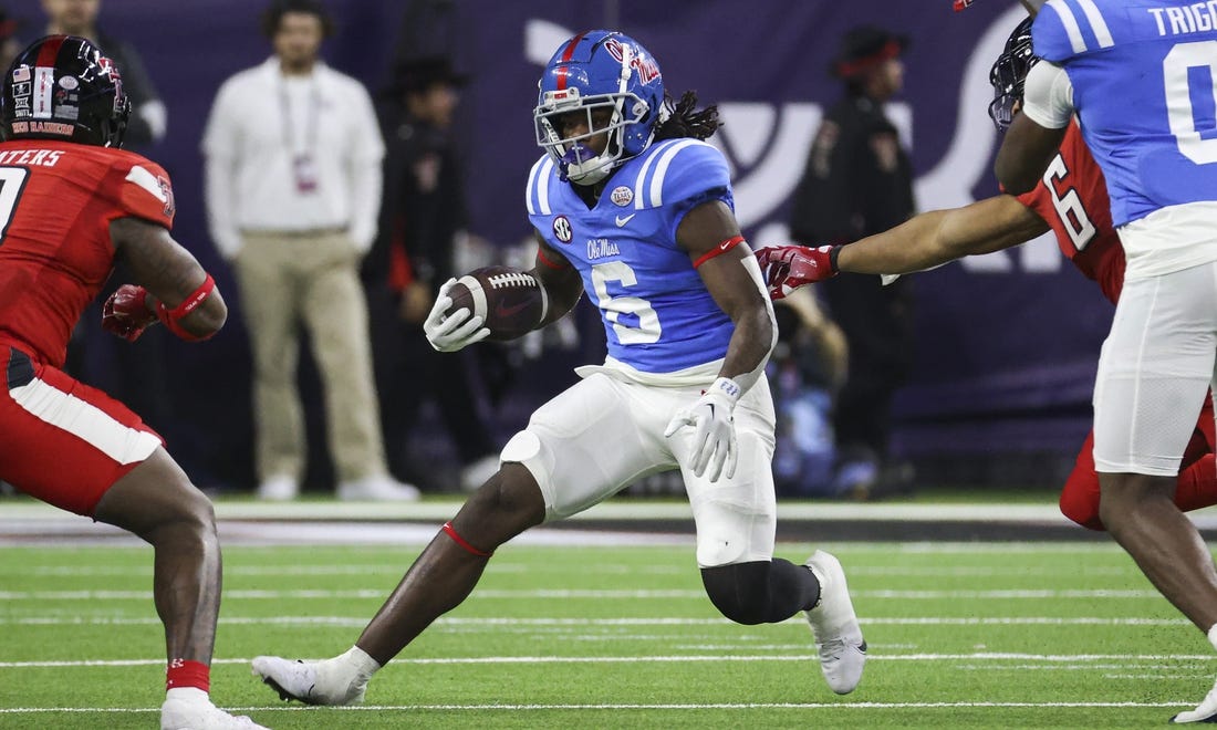 Dec 28, 2022; Houston, Texas, USA; Mississippi Rebels running back Zach Evans (6) runs with the ball during the second quarter against the Texas Tech Red Raiders in the 2022 Texas Bowl at NRG Stadium. Mandatory Credit: Troy Taormina-USA TODAY Sports