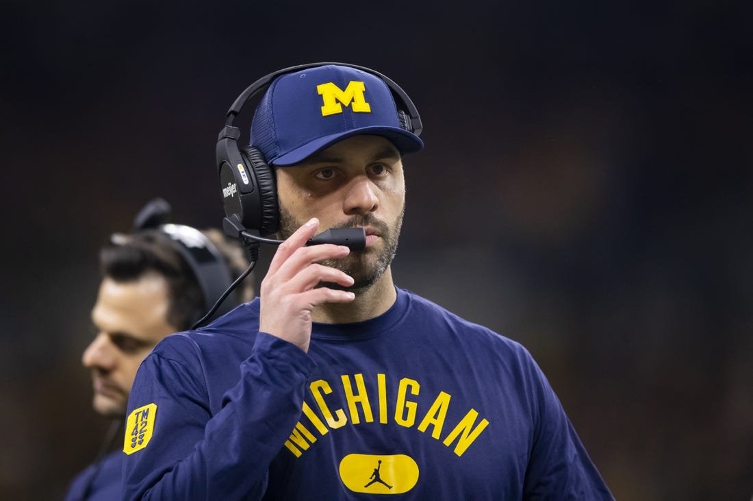 Dec 4, 2021; Indianapolis, IN, USA; Michigan Wolverines assistant coach Matt Weiss against the Iowa Hawkeyes in the Big Ten Conference championship game at Lucas Oil Stadium. Mandatory Credit: Mark J. Rebilas-USA TODAY Sports