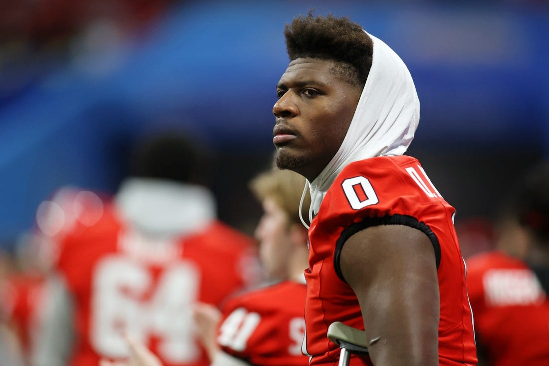 Dec 31, 2022; Atlanta, Georgia, USA; Georgia Bulldogs tight end Darnell Washington (0) looks on from the sideline after exiting the game with an injury against the Ohio State Buckeyes during the third quarter of the 2022 Peach Bowl at Mercedes-Benz Stadium. Mandatory Credit: Brett Davis-USA TODAY Sports