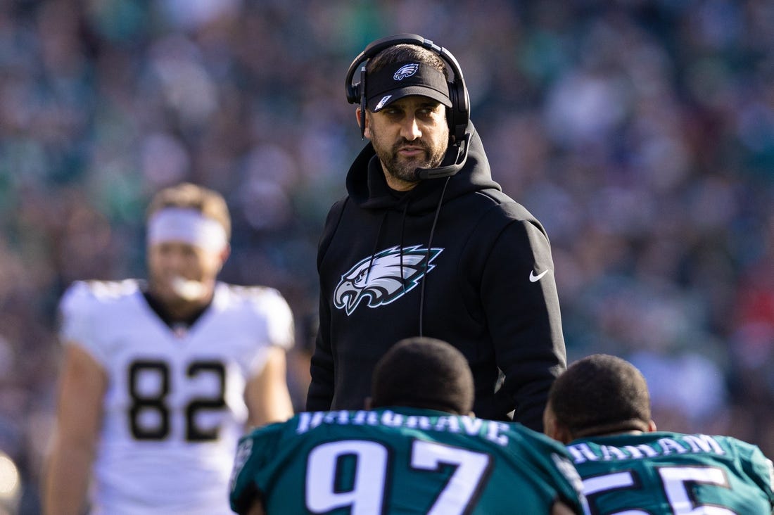Jan 1, 2023; Philadelphia, Pennsylvania, USA; Philadelphia Eagles head coach Nick Sirianni talks with defensive tackle Javon Hargrave (97) and defensive end Brandon Graham (55) during an injury timeout in the first quarter against the New Orleans Saints at Lincoln Financial Field. Mandatory Credit: Bill Streicher-USA TODAY Sports