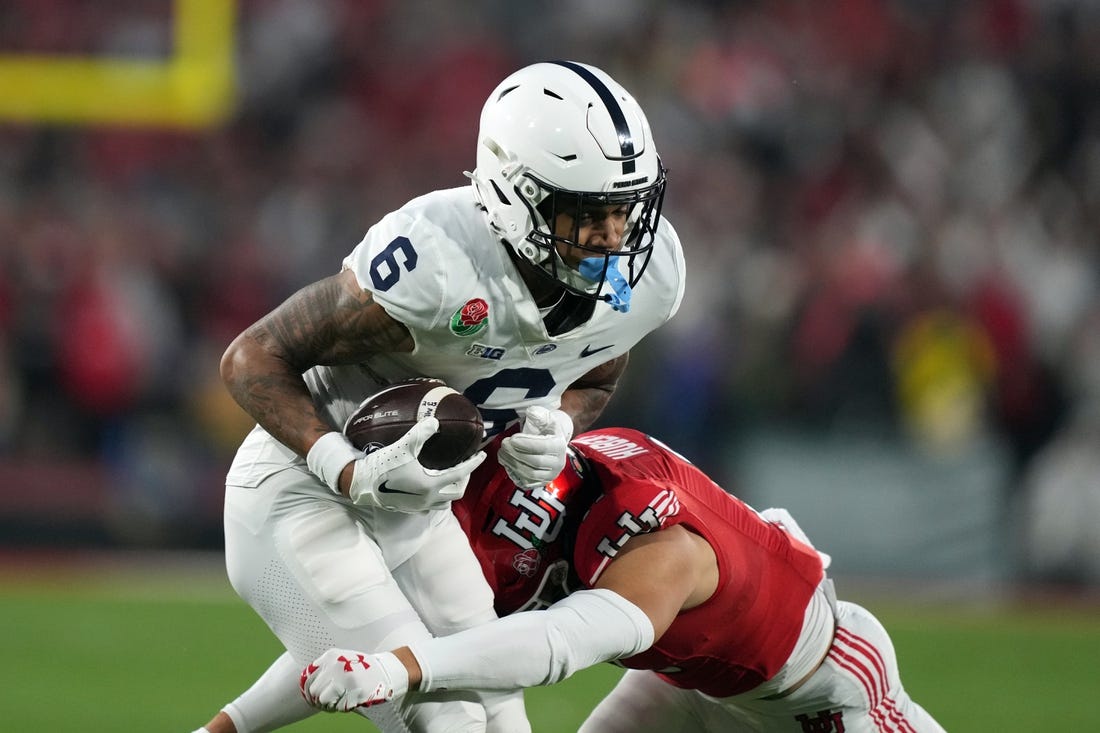 Jan 2, 2023; Pasadena, California, USA; Penn State Nittany Lions wide receiver Harrison Wallace III (6) makes a catch against Utah Utes safety R.J. Hubert (11) in the second half of the 109th Rose Bowl game at the Rose Bowl. Mandatory Credit: Kirby Lee-USA TODAY Sports