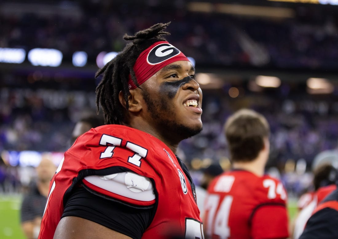 Jan 9, 2023; Inglewood, CA, USA; Georgia Bulldogs offensive lineman Devin Willock (77) against the TCU Horned Frogs during the CFP national championship game at SoFi Stadium. Mandatory Credit: Mark J. Rebilas-USA TODAY Sports