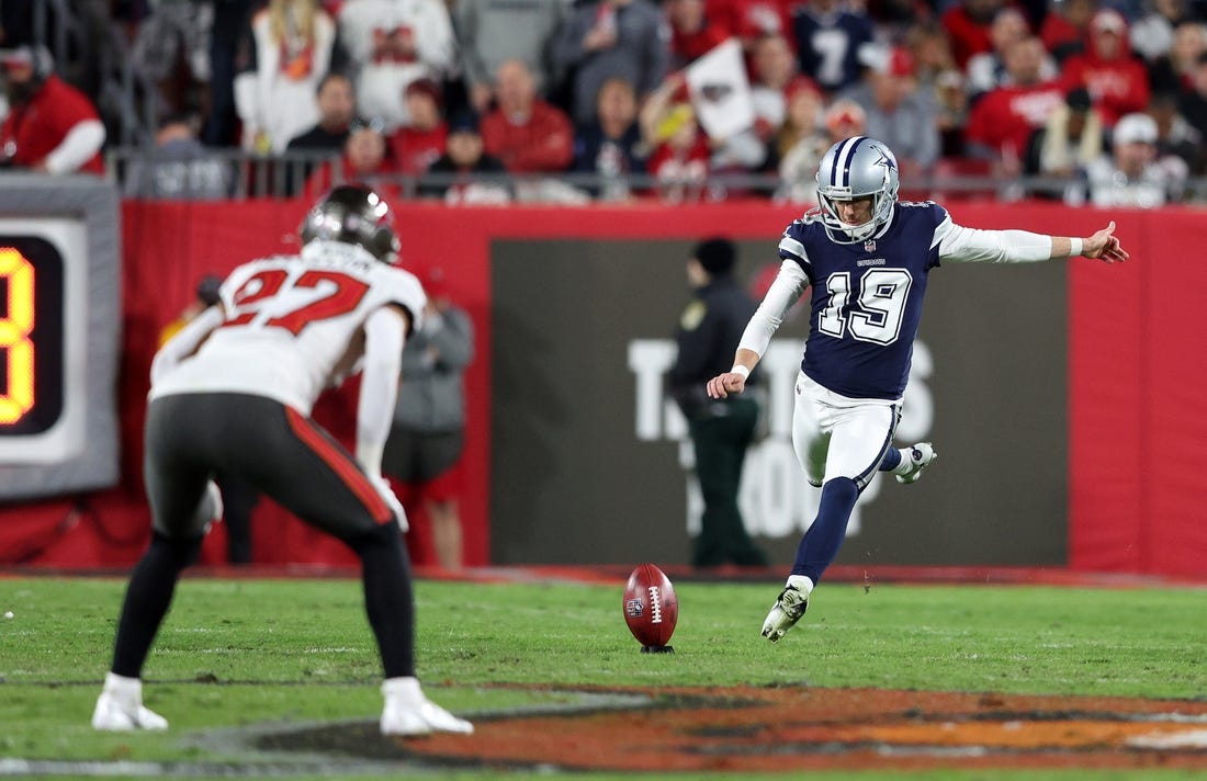 Jan 16, 2023; Tampa, Florida, USA; Dallas Cowboys place kicker Brett Maher (19) kicks the ball to the Tampa Bay Buccaneers in the first half during the wild card game at Raymond James Stadium. Mandatory Credit: Nathan Ray Seebeck-USA TODAY Sports