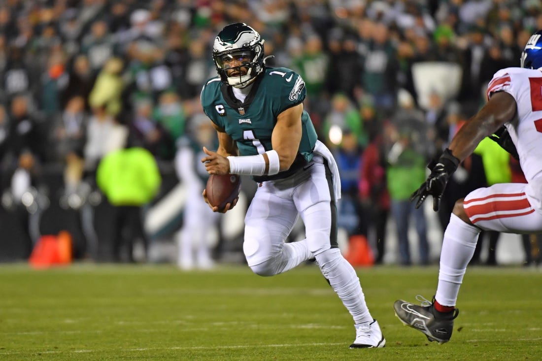 Jan 21, 2023; Philadelphia, Pennsylvania, USA; Philadelphia Eagles quarterback Jalen Hurts (1) runs against the New York Giants during an NFC divisional round game at Lincoln Financial Field. Mandatory Credit: Eric Hartline-USA TODAY Sports