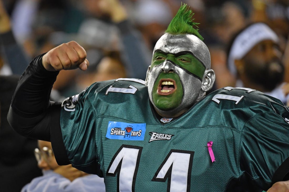 Oct 16, 2022; Philadelphia, Pennsylvania, USA; Philadelphia Eagles fan celebrates during win against the Dallas Cowboys during the fourth quarter at Lincoln Financial Field. Mandatory Credit: Eric Hartline-USA TODAY Sports
