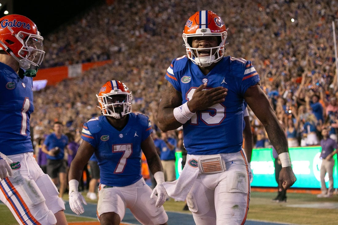 Florida Gators quarterback Anthony Richardson (15) celebrates after diving into the end zone for a touchdown in the second half against LSU at Steve Spurrier Field at Ben Hill Griffin Stadium in Gainesville, FL on Saturday, October 15, 2022. [Doug Engle/Gainesville Sun]

Ncaa Football Florida Gators Vs Lsu Tigers