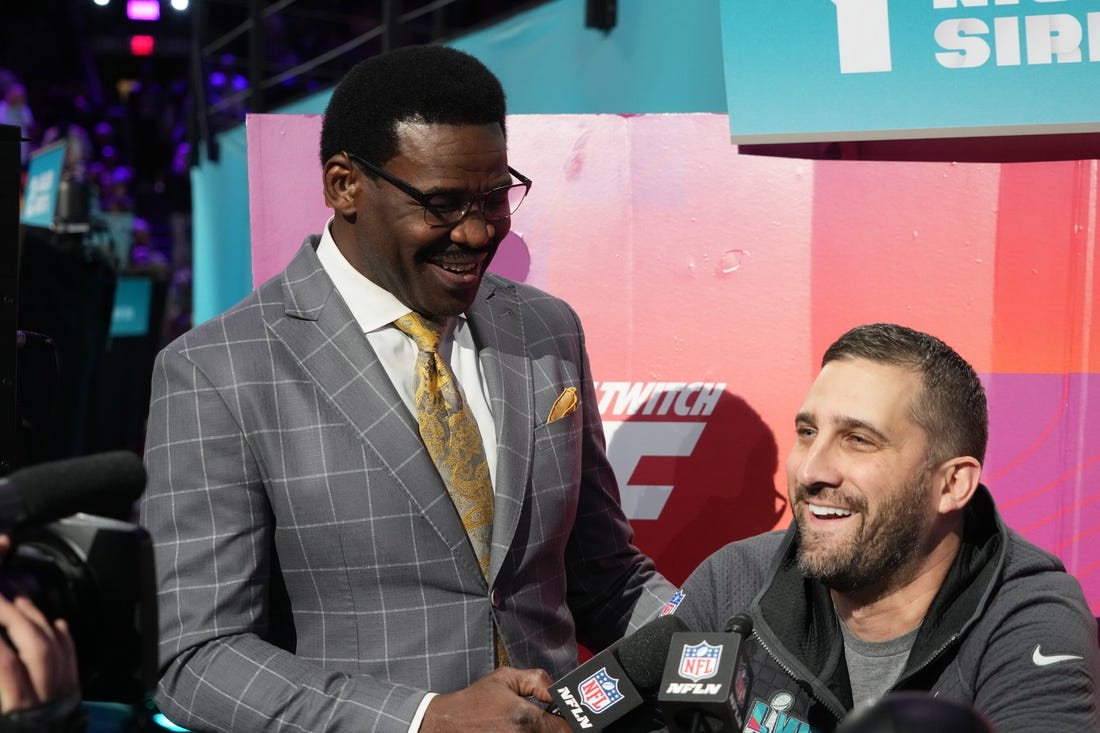 Feb 6, 2023; Phoenix, AZ, USA; NFL Network reporter Michael Irvin speaks with Philadelphia Eagles head coach Nick Sirianni during Super Bowl Opening Night at Footprint Center. Mandatory Credit: Kirby Lee-USA TODAY Sports