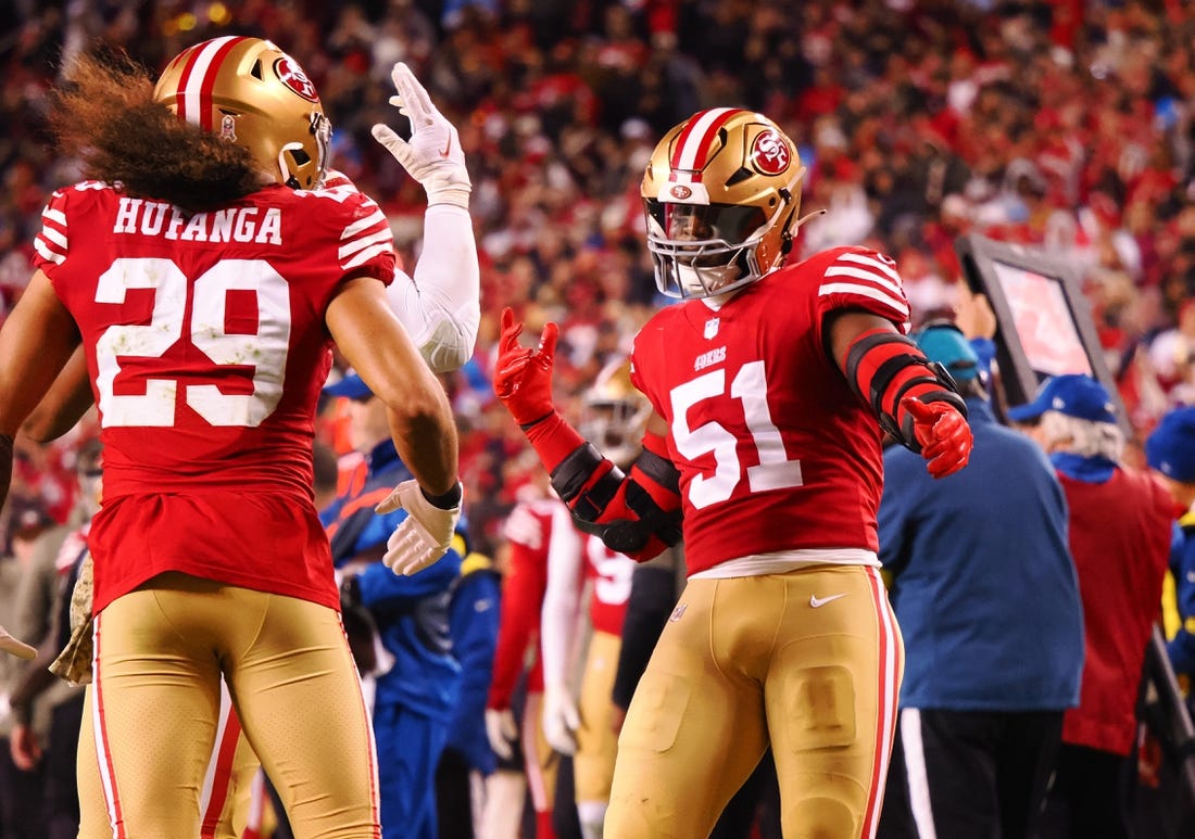Nov 13, 2022; Santa Clara, California, USA; San Francisco 49ers linebacker Azeez Al-Shaair (51) celebrates with safety Talanoa Hufanga (29) after a play against the Los Angeles Chargers during the fourth quarter at Levi's Stadium. Mandatory Credit: Kelley L Cox-USA TODAY Sports