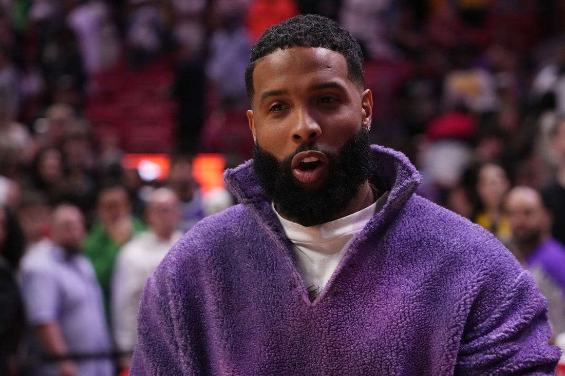 Dec 28, 2022; Miami, Florida, USA;  Football player Odell Beckham stands on the court after the game between the Miami Heat and the Los Angeles Lakers at FTX Arena. Mandatory Credit: Jasen Vinlove-USA TODAY Sports
