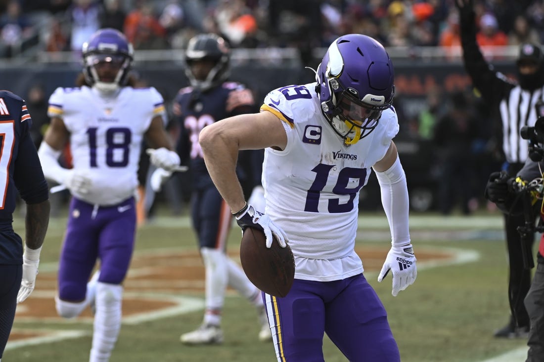 Jan 8, 2023; Chicago, Illinois, USA;  Minnesota Vikings wide receiver Adam Thielen (19) celebrates his touchdown against the Chicago Bears during the first half at Soldier Field. Mandatory Credit: Matt Marton-USA TODAY Sports