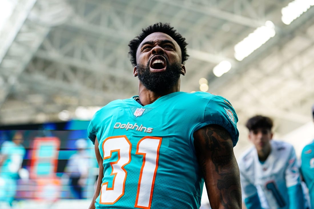Jan 8, 2023; Miami Gardens, Florida, USA; Miami Dolphins running back Raheem Mostert (31) enters the field prior to a game against the New York Jets at Hard Rock Stadium. Mandatory Credit: Rich Storry-USA TODAY Sports