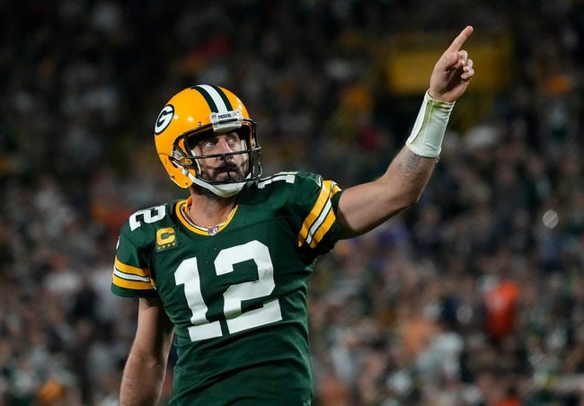Green Bay Packers quarterback Aaron Rodgers (12) celebrates after rushing for a first down during the fourth quarter of their game against the Chicago Bears on Sunday, Sept. 18, 2022 at Lambeau Field in Green Bay.

Mjs Packers Bears Packers19 3137 114468354