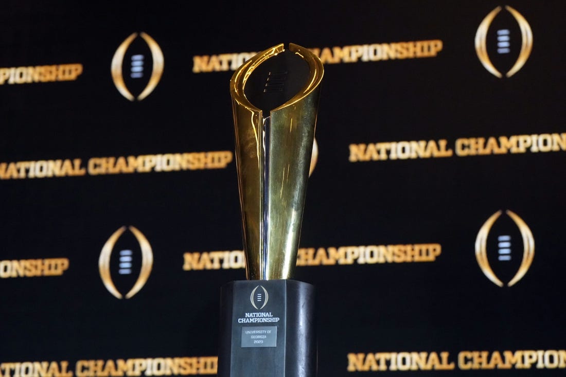 Jan 10, 2023; Los Angeles, CA, USA; The College Football Playoff National Championship trophy at CFP Champions press conference at Los Angeles Airport Marriott. Mandatory Credit: Kirby Lee-USA TODAY Sports