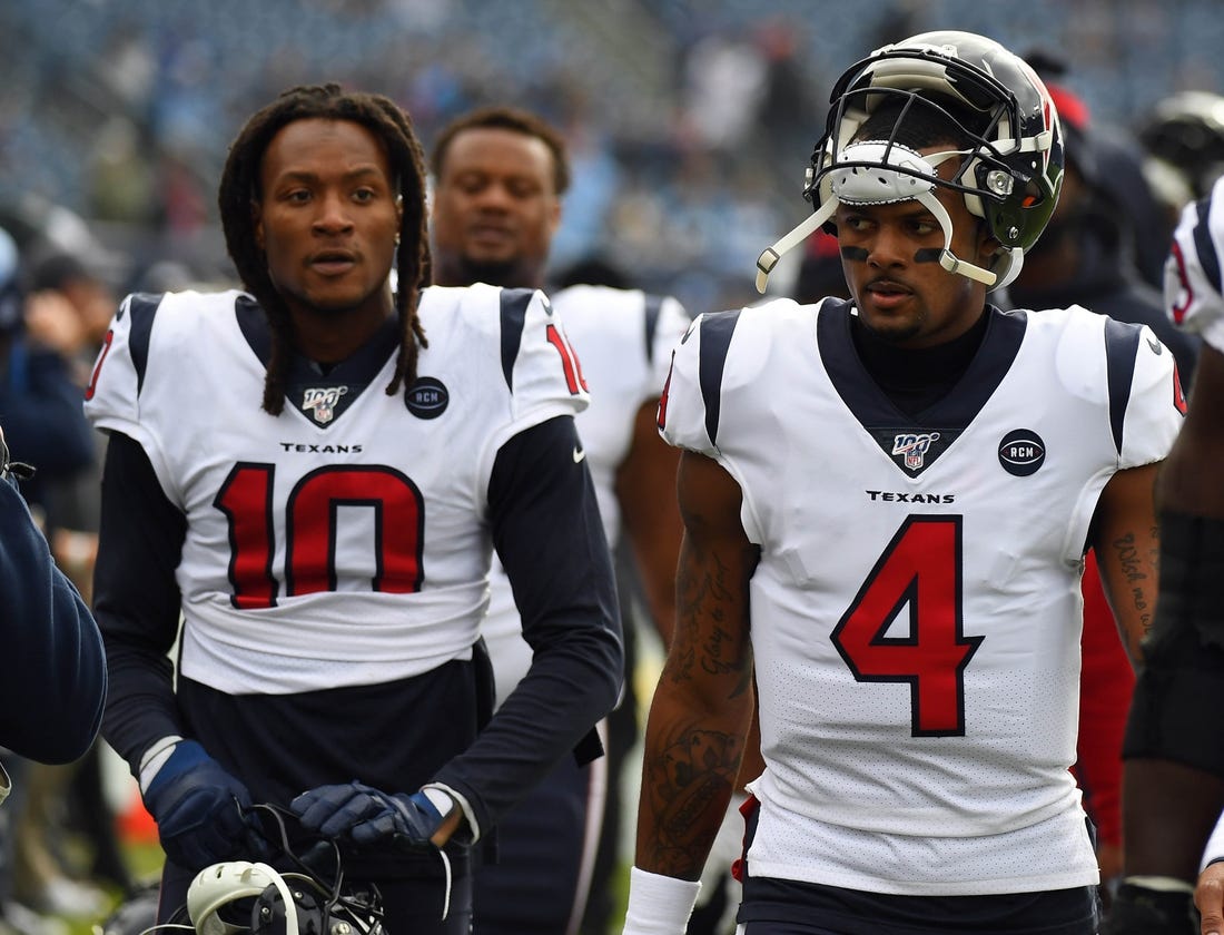 Dec 15, 2019; Nashville, TN, USA; Houston Texans quarterback Deshaun Watson (4) and Houston Texans wide receiver DeAndre Hopkins (10) walk off the field after warmups before the game against the Tennessee Titans at Nissan Stadium. Mandatory Credit: Christopher Hanewinckel-USA TODAY Sports
