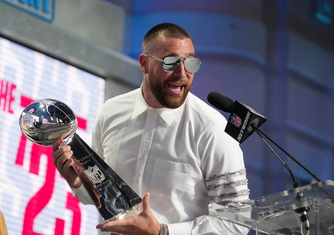 Apr 27, 2023; Kansas City, MO, USA; Kansas City Chiefs tight end Travis Kelce greets fans during the first round of the 2023 NFL Draft at Union Station. Mandatory Credit: Kirby Lee-USA TODAY Sports