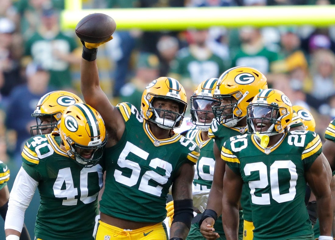 Green Bay Packers linebacker Rashan Gary (52) celebrates with teammates after sacking New England Patriots quarterback Bailey Zappe during their football game Sunday, October 2, at Lambeau Field in Green Bay, Wis. Dan Powers/USA TODAY NETWORK-Wisconsin

Apc Packvspatriots 1002221286djpc