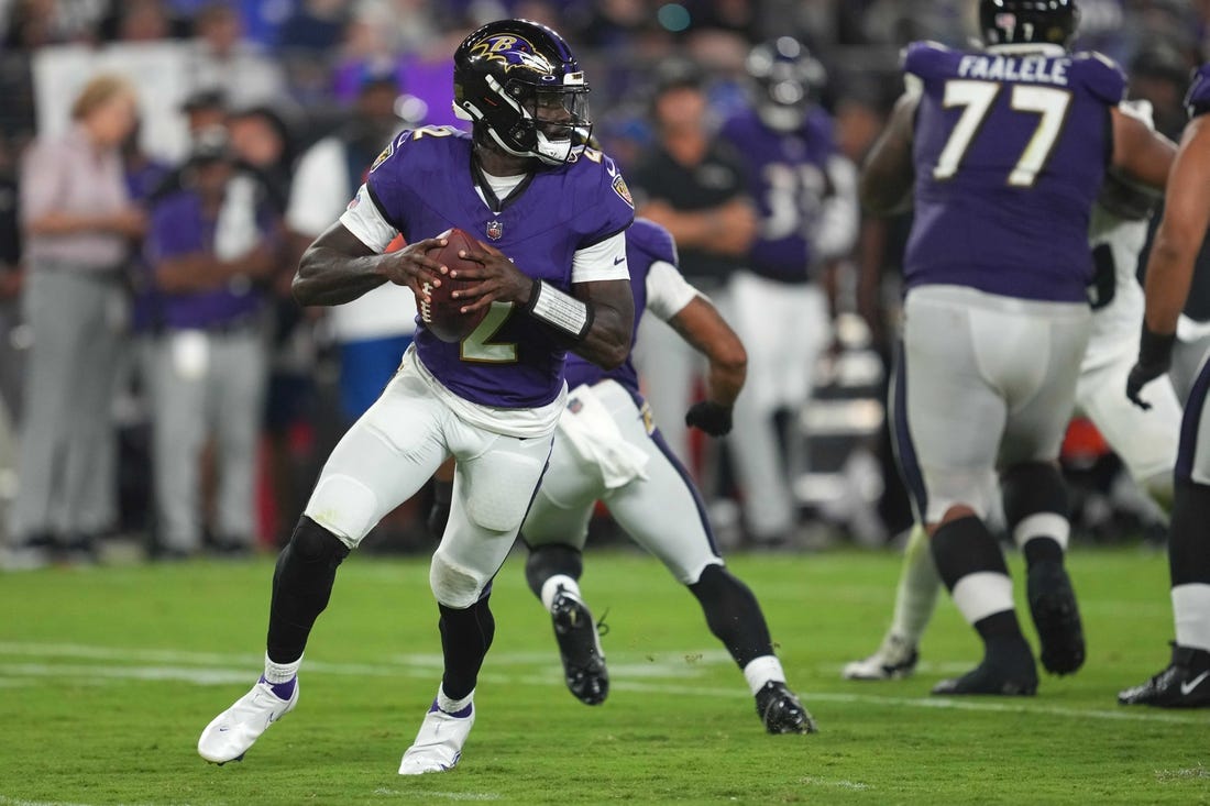 Aug 12, 2023; Baltimore, Maryland, USA; Baltimore Ravens quarterback Tyler Huntley (2) rolls out to pass in the third quarter against the Philadelphia Eagles at M&T Bank Stadium. Mandatory Credit: Mitch Stringer-USA TODAY Sports