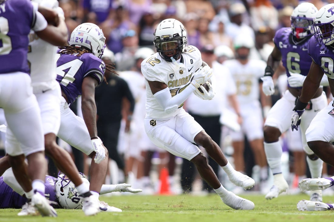 Sep 2, 2023; Fort Worth, Texas, USA; Colorado Buffaloes wide receiver Travis Hunter (12) runs after catching a ball in the first half against the TCU Horned Frogs at Amon G. Carter Stadium. Mandatory Credit: Tim Heitman-USA TODAY Sports