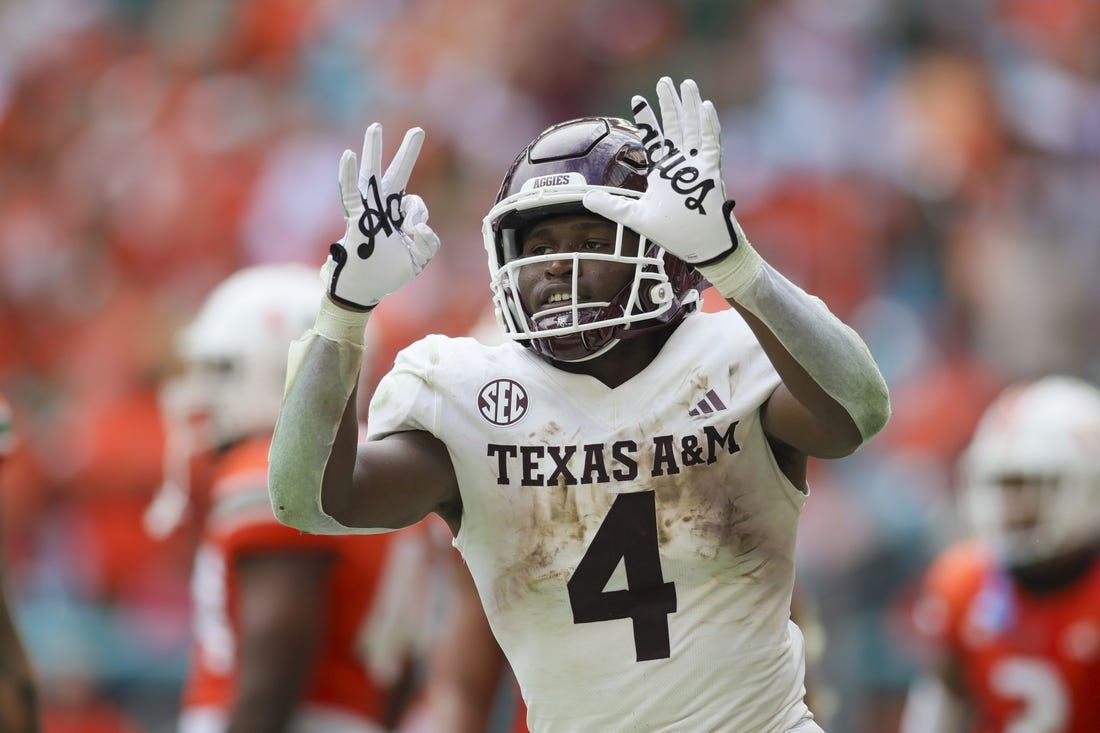 Sep 9, 2023; Miami Gardens, Florida, USA; Texas A&M Aggies running back Amari Daniels (4) reacts after scoring a touchdown against the Miami Hurricanes during the second quarter at Hard Rock Stadium. Mandatory Credit: Sam Navarro-USA TODAY Sports