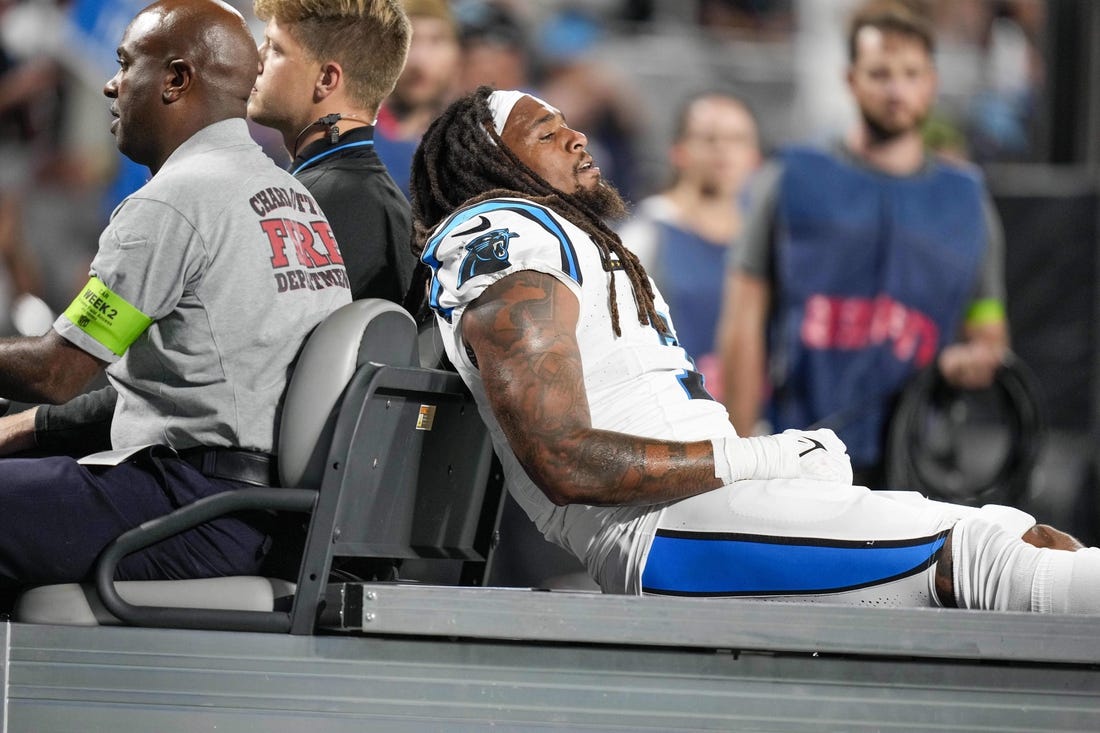Sep 18, 2023; Charlotte, North Carolina, USA; Carolina Panthers linebacker Shaq Thompson (7) is carted to the locker room after an injury  during the first quarter against the New Orleans Saints at Bank of America Stadium. Mandatory Credit: Jim Dedmon-USA TODAY Sports